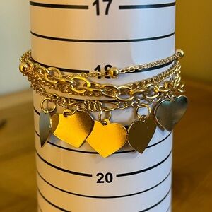 4 strand gold tone heart bracelet with extension 5 golden hearts 6 1/2 “